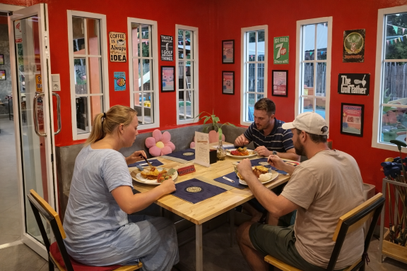 Guests dining at Hangdong Minigolf Chiang Mai German Restaurant indoor seating