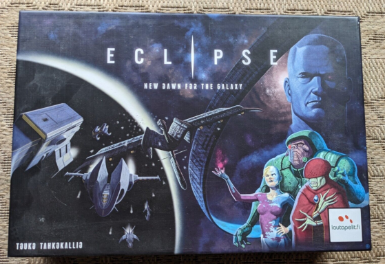 Board game box for "Eclipse," featuring sci-fi elements and characters.