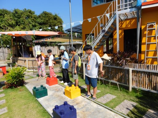 Kids playing mini golf at Hangdong Minigolf Chiang Mai German Restaurant outdoor activity