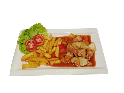 Grilled chicken in sauce with fries, lettuce, and tomato slices on a white plate.