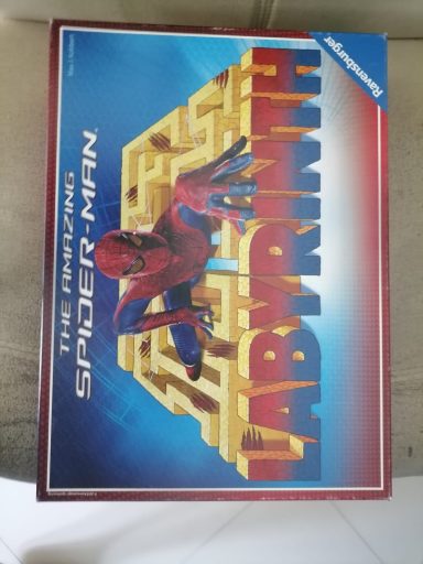 Spider-Man featured on the game box for "Labyrinth." Bright colors and dynamic design.